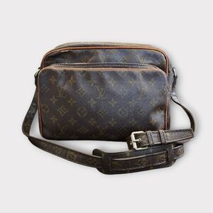 Sold “As is” Louis Vuitton Vintage Brown Monogram Crossbody Bag.